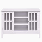 A sleek white entertainment center with two doors, providing a modern storage solution for media devices.